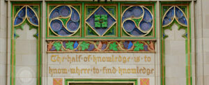 Front of Dodd Hall, writing on building reads "The half of knowledge is to know where to find knowledge"