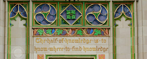Front of Dodd Hall, writing on building reads "The half of knowledge is to know where to find knowledge"